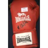 James DeGale signed red Lonsdale boxing glove with CoA from Montage Moments. P&P Group 2 (£18+VAT