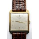 Gents 9ct gold Record Deluxe 17 jewel Swiss movement wristwatch on leather strap, case W: 27 mm. P&P