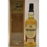 Bottle of 1982 Knockando single malt scotch whisky with case by Justerini & Brooks bottled 1996,
