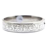 Hallmarked silver engraved hinged bangle, D: 70 mm, 26g. P&P Group 1 (£14+VAT for the first lot