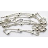 Silver delicate ball and trace charm, L: 69 cm. P&P Group 1 (£14+VAT for the first lot and £1+VAT