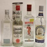 Four bottles of mixed gin, Beefeater, Plymouth etc. P&P Group 3 (£25+VAT for the first lot and £5+