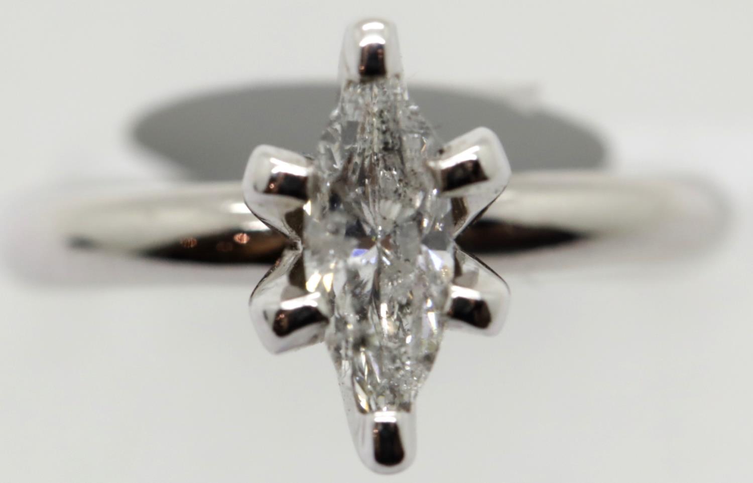 Ladies 18ct white gold marquis cut diamond ring, 0.67 ct, size L, 4.2g. P&P Group 1 (£14+VAT for the