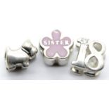 Three Pandora style charms, a Scottie dog, sister and stone set. P&P Group 1 (£14+VAT for the