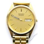 Gold plated Seiko day date wristwatch. P&P Group 1 (£14+VAT for the first lot and £1+VAT for