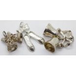 Three 1970s 925 silver assorted charms, 8.4g. P&P Group 1 (£14+VAT for the first lot and £1+VAT