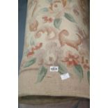 Large pink ground Chinese woollen floral pattern fringed rug, W: 3.5m. Requires cleaning but no