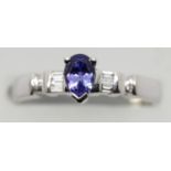 Ladies 18ct white gold, tanzanite and diamond fancy ring, RRP £700.00, size N, 3.9g. P&P Group 1 (£