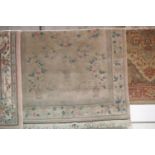 Pink ground floral rug with fringe, L: 3m, W: 1.6m. This lot is not available for in-house P&P,