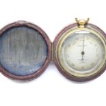 Chadburn's, Liverpool: a gilt brass cased compensated pocket barometer, D: 45 mm, with its