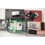 Collection of mixed digital cameras including Nikon, Olympus, Canon, Casio and Fugi. P&P Group 2 (£