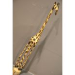 Large hand carved ethnic giraffe figurine, H: 90 cm. This lot is not available for in-house P&P,