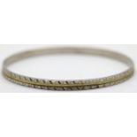 Vintage diamond cut slave bangle, D: 6.5 cm. P&P Group 1 (£14+VAT for the first lot and £1+VAT for