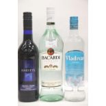Bacardi 1l, Vladivar vodka 70cl and a Harveys Bristol Cream sherry 75cl. P&P Group 3 (£25+VAT for