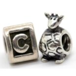 Two Pandora charms stamped A.L.E. P&P Group 1 (£14+VAT for the first lot and £1+VAT for subsequent
