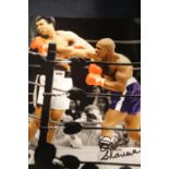 Earnie Shavers signed photograph vs Muhammad Ali with Allstars 29332 sticker, 20 x 25 cm. P&P