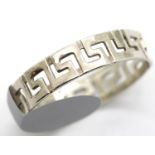 Silver Greek Key design band ring, size R. P&P Group 1 (£14+VAT for the first lot and £1+VAT for