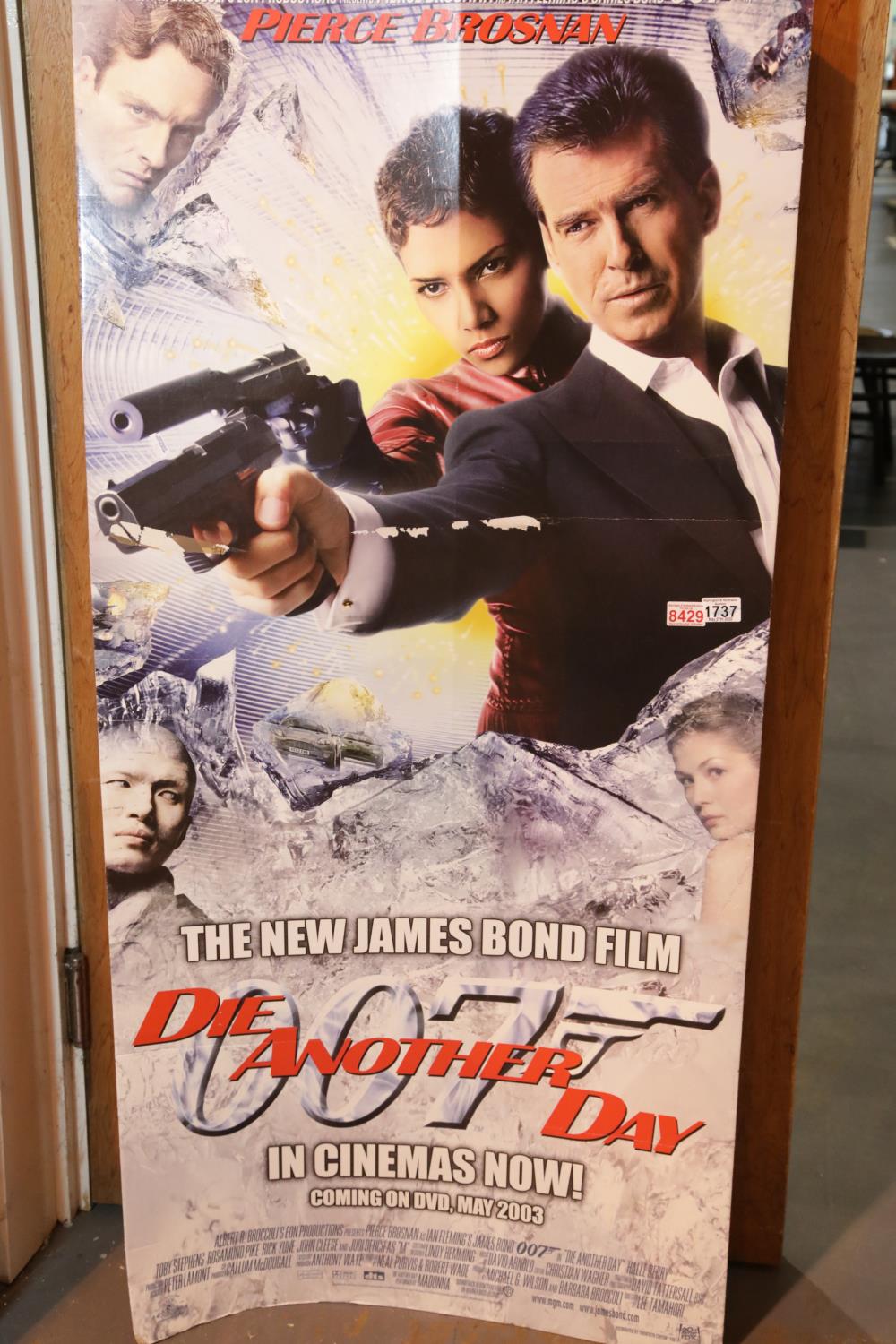 James Bond Die Another Day cardboard cinema advertising display, H: 148 cm. Tape damage near centre.