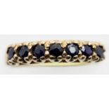 Vintage 9ct yellow gold seven stone sapphire ring, size M, 2.6g. P&P Group 1 (£14+VAT for the