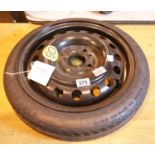 Nissan steel rim spare wheel T105/70 R14. P&P Group 3 (£25+VAT for the first lot and £5+VAT for