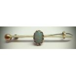 15ct gold opal set brooch, 2.2g. P&P Group 1 (£14+VAT for the first lot and £1+VAT for subsequent