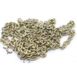 Yellow metal long fancy chain L: 140 cm. P&P Group 1 (£14+VAT for the first lot and £1+VAT for