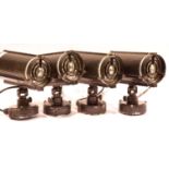 Four metal cased industrial type light fittings. P&P Group 3 (£25+VAT for the first lot and £5+VAT