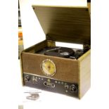 GPO Maestro Music Centre; three speed turntable; MP3/USB player; bluetooth; FM radio; wooden