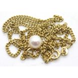 Single genuine pearl pendant on a 9ct gold chain L: 45 cm 4.1g. P&P Group 1 (£14+VAT for the first