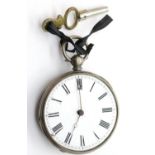 Hallmarked silver fob watch with key lacking glass. Working at lotting up. P&P Group 1 (£14+VAT