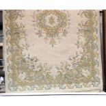 Cream and green ground floral rug with fringe, L: 1.8 m, W: 0.9 m. This lot is not available for