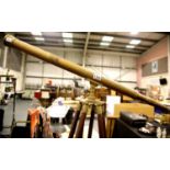 Large antique type brass monocular telescope, H: 98 cm, on a mahogany tripod, H: 140 cm. This lot is
