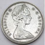 Silver Canadian 1966 one dollar coin. P&P Group 1 (£14+VAT for the first lot and £1+VAT for
