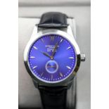 New boxed Anthony James blue faced wristwatch on a leather strap. P&P Group 1 (£14+VAT for the first