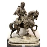 Cast metal arab mounted on a stallion, H: 70 cm, signed but ilegible. This lot is not available