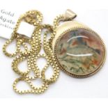9ct gold moss agate pendant on a 45 cm 9ct gold chain, 7.5g. P&P group 1 (£14 for the first lot