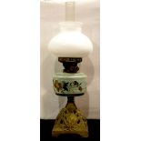 Late Victorian paraffin lamp with glass reservoir. This lot is not available for in-house P&P.