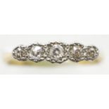 Antique 18ct gold and platinum 1920s five stone diamond ring, size P, 2.6g. P&P Group 1 (£14+VAT for