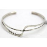 Ladies 925 silver torque bangle, W: 65 mm, 12g. P&P Group 1 (£14+VAT for the first lot and £1+VAT