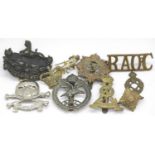 British WWI style and later mixed cap badges, pips, shoulder titles etc. P&P Group 1 (£14+VAT for