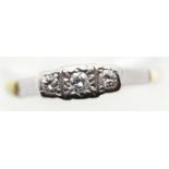 Antique 18ct gold and platinum three stone diamond ring, size Q, 2.0g. P&P Group 1 (£14+VAT for