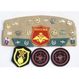 Russian side cap mounted with various Russian military badges and patches. P&P Group 1 (£14+VAT