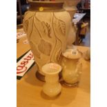 Three ceramic vases of various heights, smallest being alabaster. This lot is not available for in-