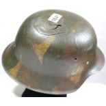 German WWII style helmet with damage to crown, lacking liner and chinstrap. P&P Group 2 (£18+VAT for