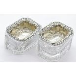 Two hallmarked silver open salts on crystal bases. P&P Group 1 (£14+VAT for the first lot and £1+VAT