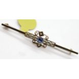 Antique 9ct rose gold, sapphire and seed pearl ornate brooch, L: 50 mm, 2.2g. P&P Group 1 (£14+VAT