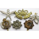 Six various military cap badges. P&P Group 1 (£14+VAT for the first lot and £1+VAT for subsequent