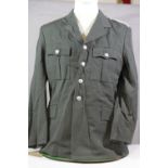 German style grey M40 tunic. P&P Group 3 (£25+VAT for the first lot and £5+VAT for subsequent lots)