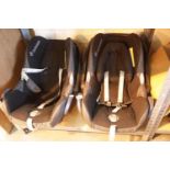 Two Maxi Cosi childs car seats. This lot is not available for in-house P&P.