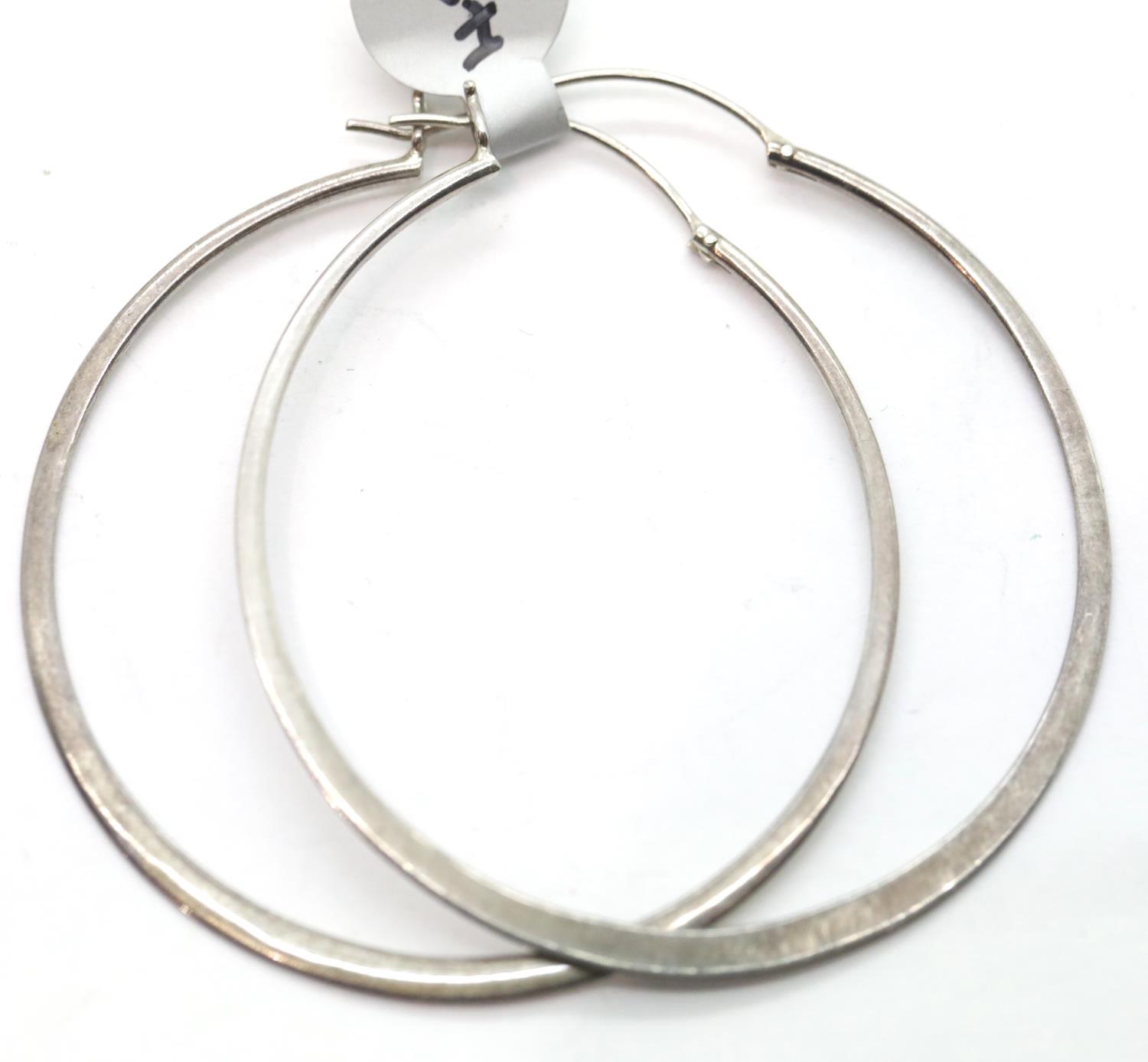 Pair of large loop 55 mm earrings. P&P Group 1 (£14+VAT for the first lot and £1+VAT for - Image 2 of 2